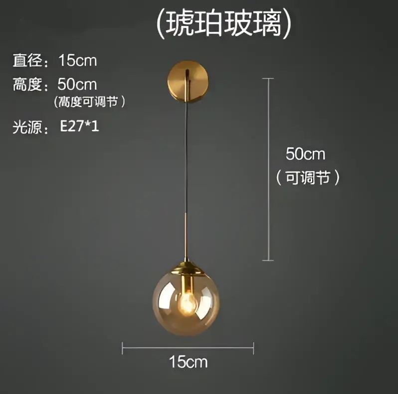 A sleek spherical glass ball led wall lamp with brass-finished metal fixture from decorbites for bathroom sconce use