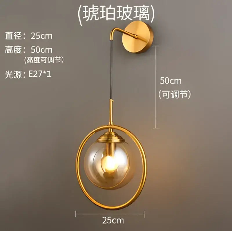Gold-toned retro brass wall lamp with amber decorbites glass ball led and adjustable height for bathroom sconce lighting