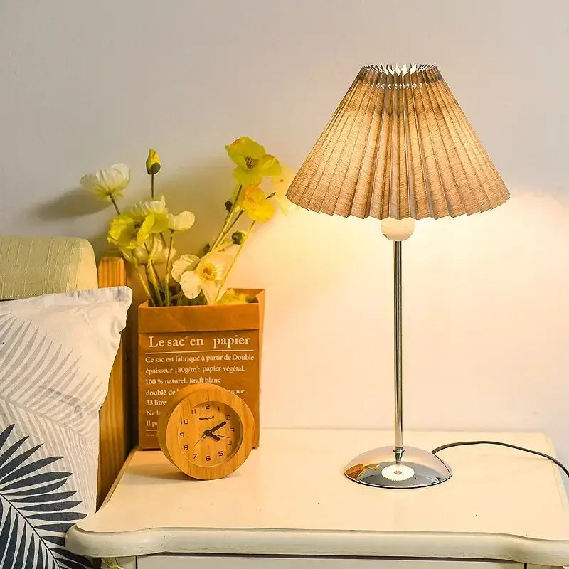Retro brass and cream decorbites adjustable pleated table lamp with warm-toned pleated paper shade and metallic base