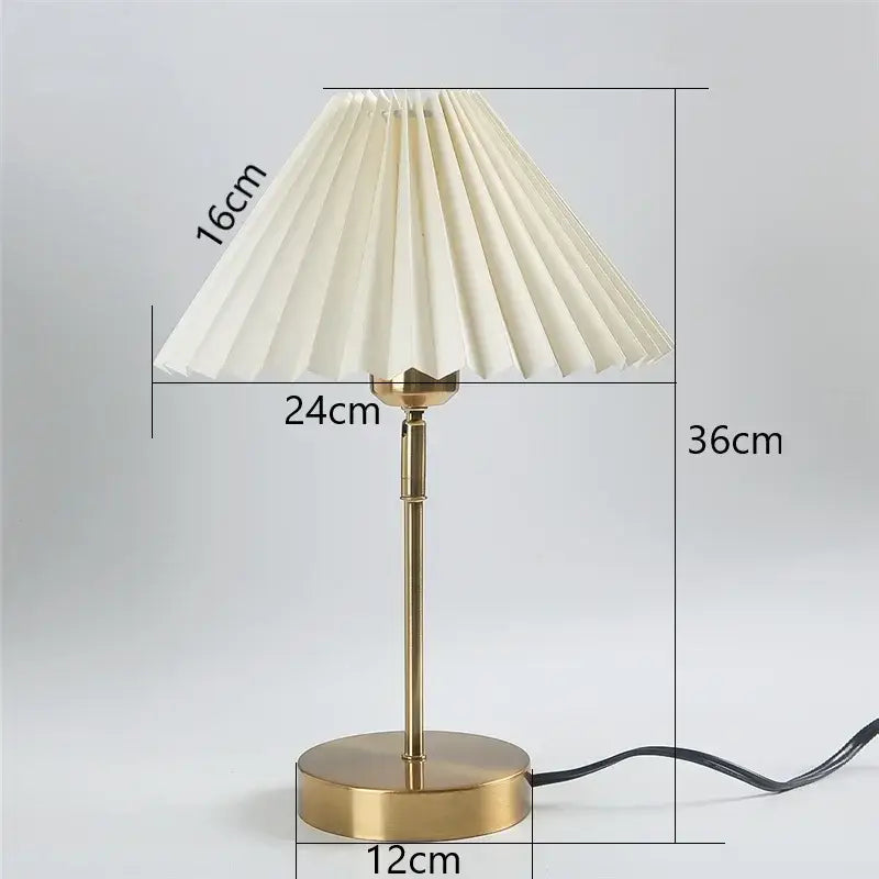 Cream-colored pleated table lamp with brass finish and dimensions marked from decorbites adjustable pleated collection