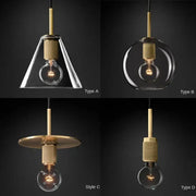 Modern pendant light with clear glass shades brass accents and exposed filament bulbs ideal for dining room decorbites gold led