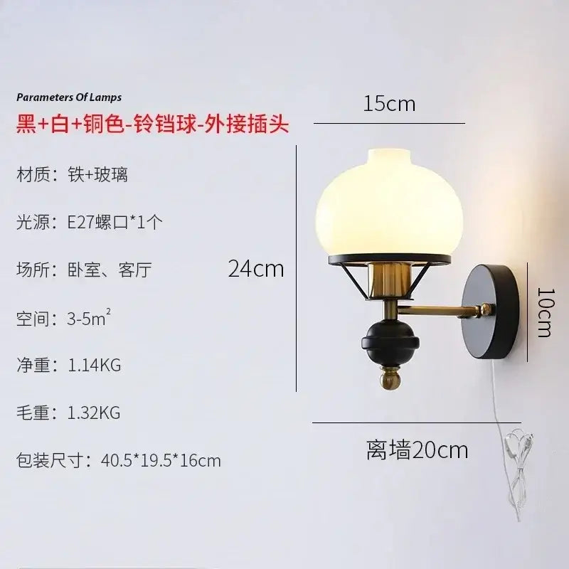 Black and brass-toned retro french wall lamp with frosted glass globe shade perfect for bedroom decorbites french wall lamp