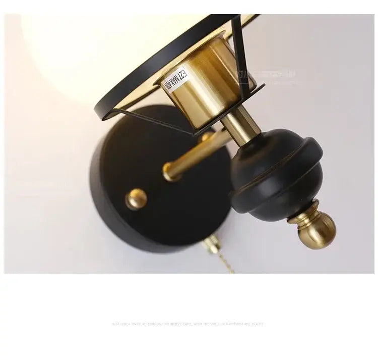 Vintage-style decorbites french wall lamp with black matte finish brass accents and oval frosted glass shade for bedroom lighting