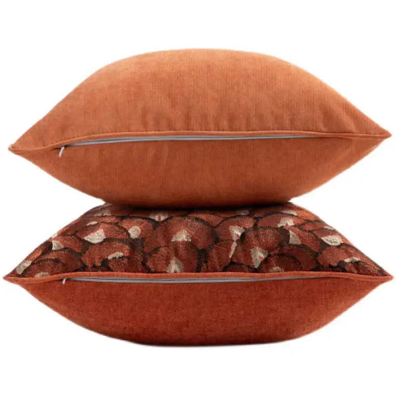 Two rust-colored throw pillows including an embroidered geometry pillow case with a leaf pattern for living room cushions