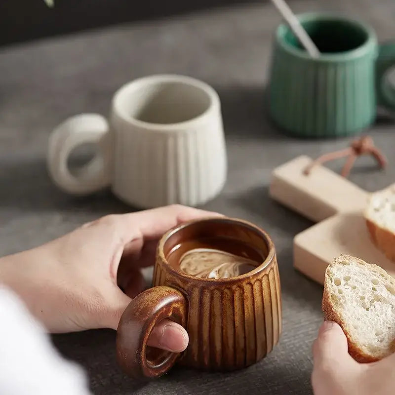 Retro brown ridged handmade nordic ceramic mug with ring handle filled with coffee for kitchen use decorbites ceramic mug