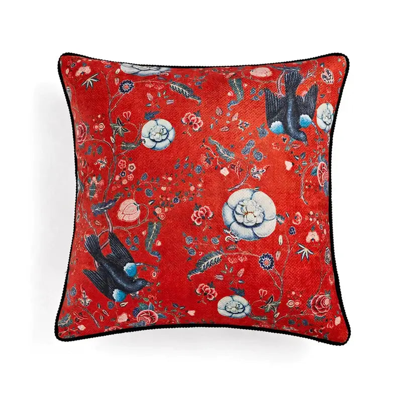 Retro circus cream pillow cover with vibrant red velvet featuring black birds white blossoms floral vines decorbites circus retro