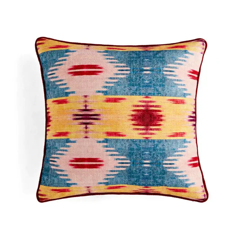 Retro circus cream pillow cover with tassels featuring vibrant blue yellow and red geometric pattern textured weave decorbites circus retro decor pillow cover