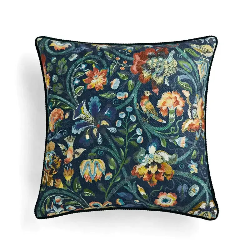 Retro circus cream pillow cover with tassels featuring vibrant floral and bird patterns on a navy background decorbites circus retro decor