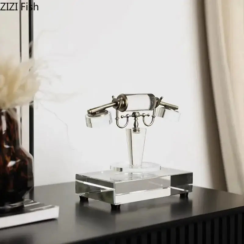 Clear crystal glass desk lamp with metallic silver accents in a sleek modern design for crystal telephone sculpture decor