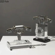Retro clear crystal telephone sculpture with silver accents and rotary dial design for office desk decor