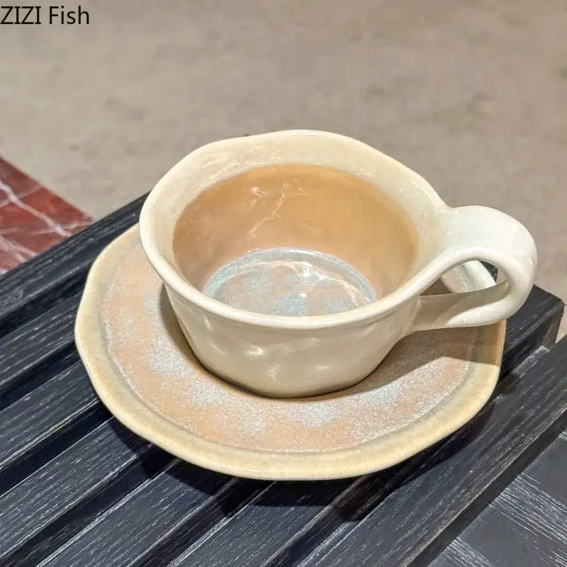 Cream-colored kiln porcelain cup and saucer with subtle textured glaze and handcrafted contours by decorbites kiln porcelain