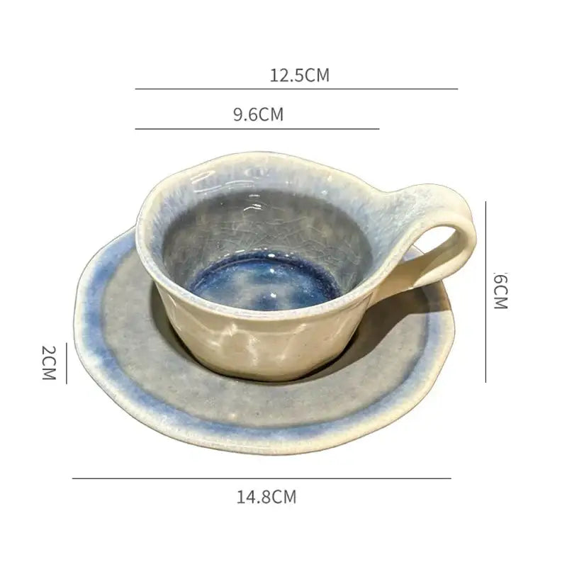 Handcrafted kiln porcelain cup and saucer with soft beige body and blue glaze from decorbites kiln porcelain set