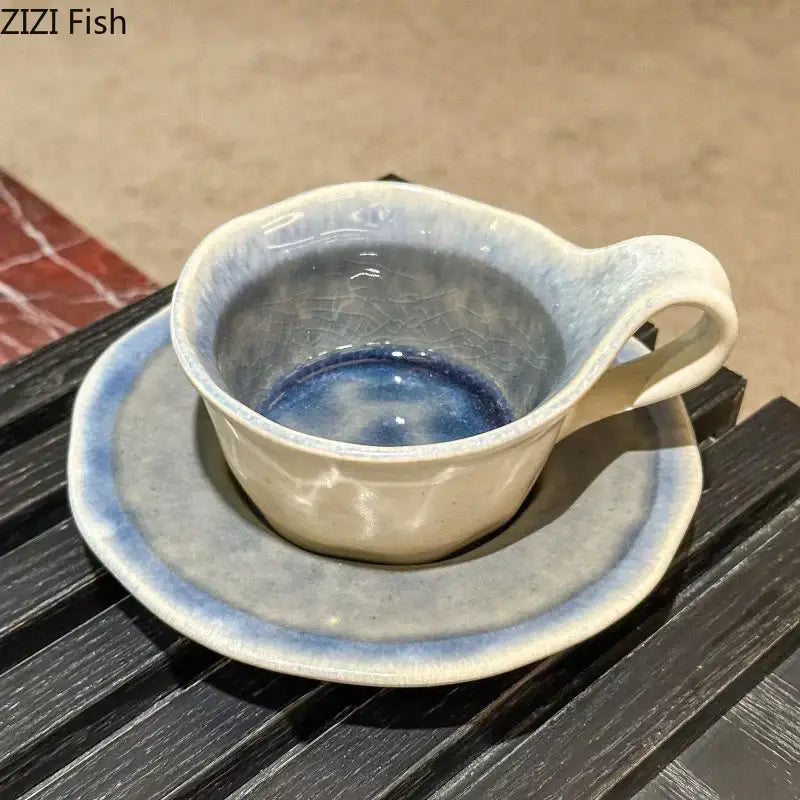 Handcrafted retro crackled blue decorbites kiln porcelain cup and saucer on dark wooden surface for dining use