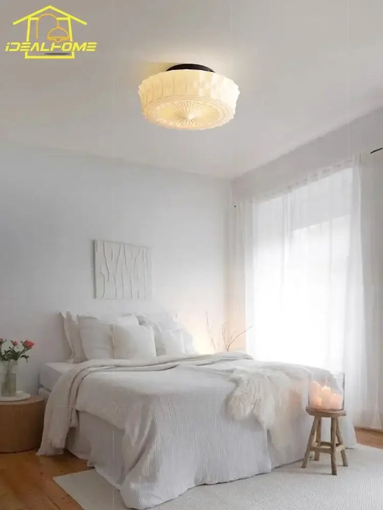 Cream glass led ceiling light with a retro circular design and subtle radial pattern for bedroom decorbites cream glass