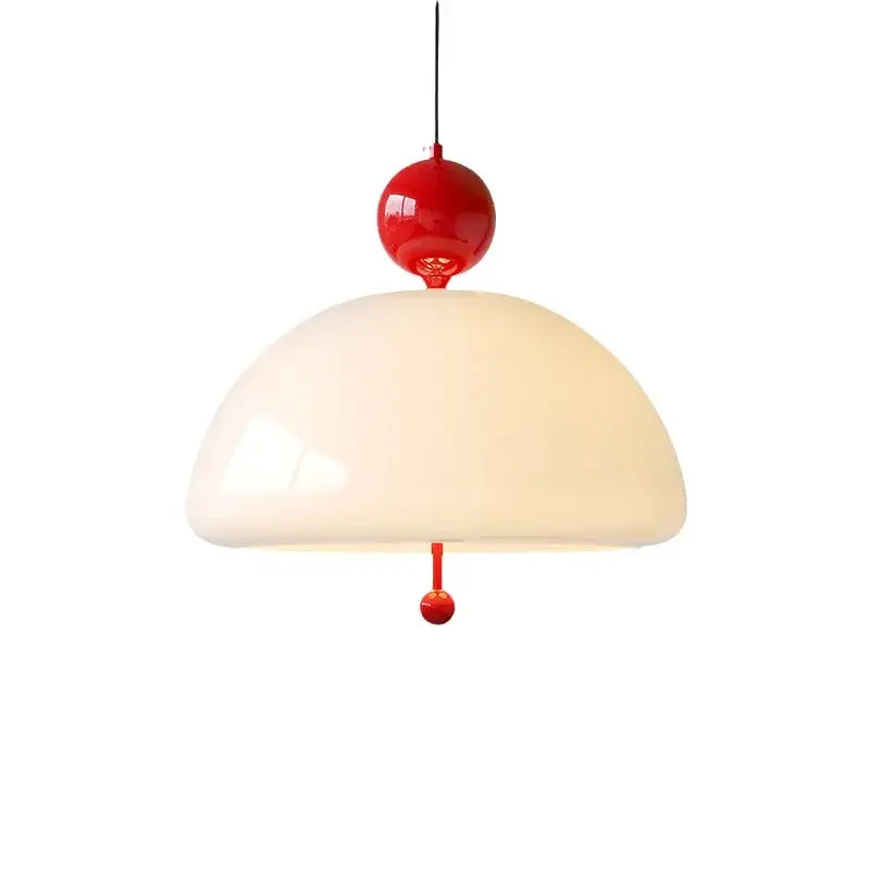 A retro cream glass pendant light with glossy red accent spheres and an off-white domed shade for dining room decorbites cream glass