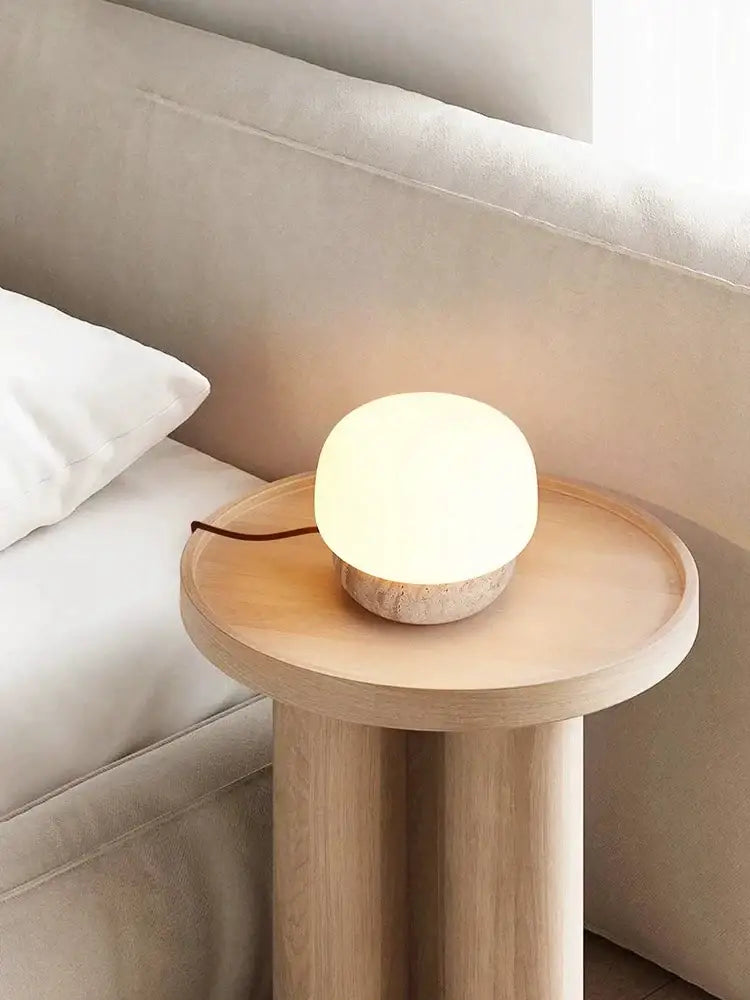 Warm softly glowing decorbites cream mushroom table lamp with matte white glass top and textured stone base for bedroom decor
