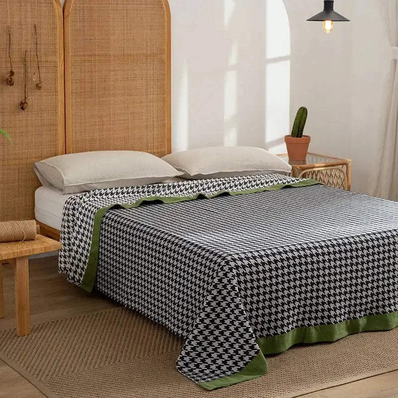 Black and white houndstooth decorbites cotton throw blanket with solid green ruffled hem for living room decor