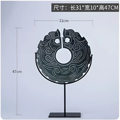Dark green intricately carved geometric totem resin statue on black stand for living room decor by decorbites