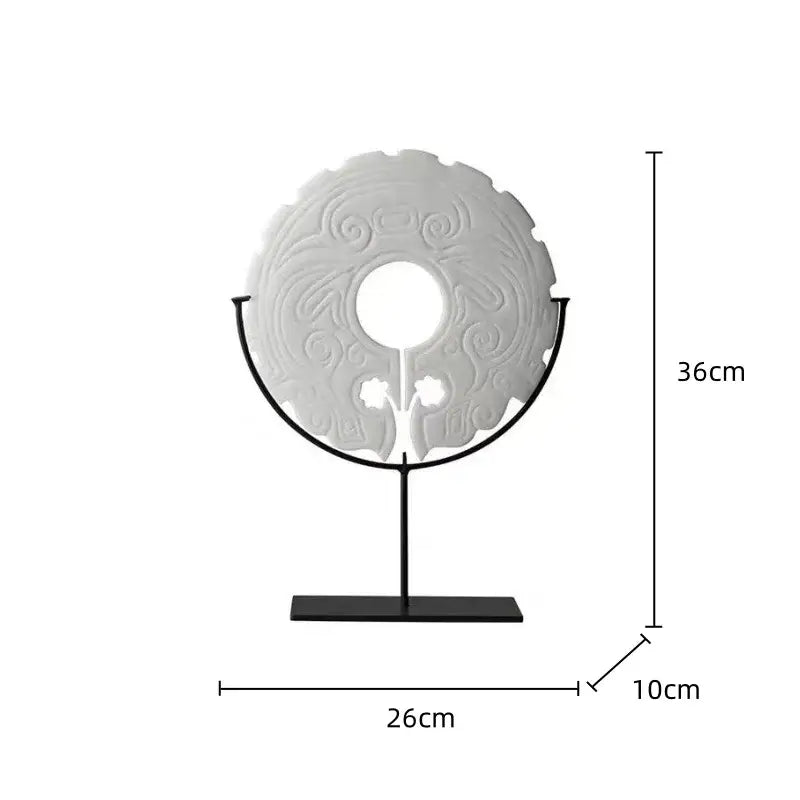 White intricately carved circular decorative geometric totem resin statue on black metal stand for living room decorbites decor