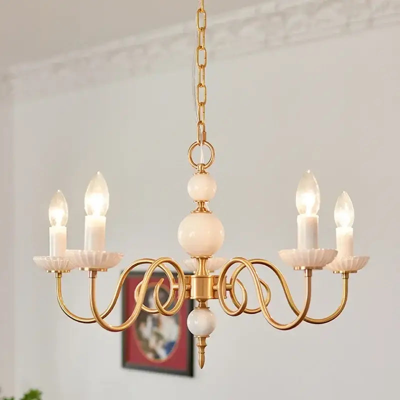 Gold-toned decorbites cream white led chandelier with ornate arms white marble spheres and candle-style bulbs for dining room