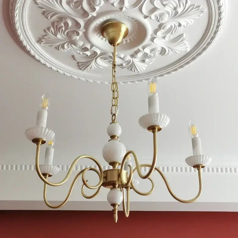 Retro decorbites cream white led chandelier with vintage brass curved arms and white ceramic candle holders for dining rooms