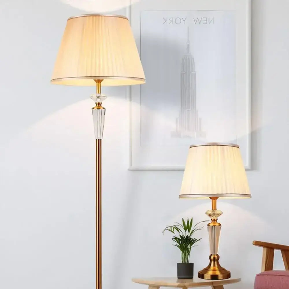 Gold-toned decorbites crystal floor lamp with a pleated beige shade and matching table lamp for living room decor