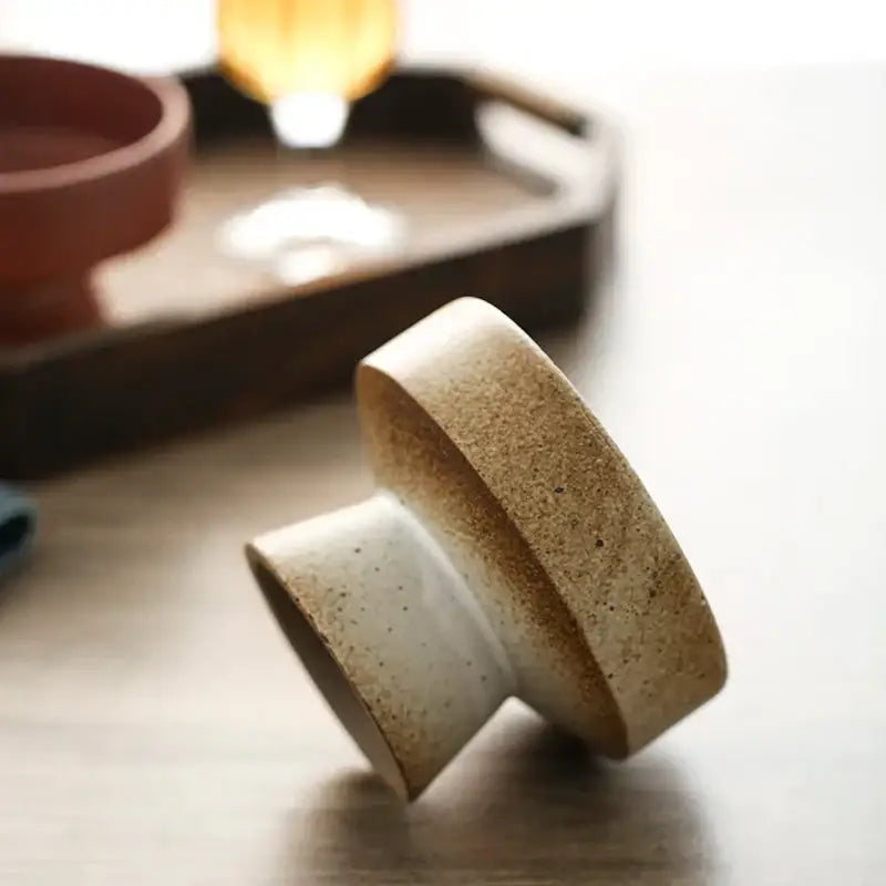 A retro floral ceramic two-toned speckled beige and white handmade footed bowl tea lid by decorbites