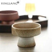 Earthenware retro floral ceramic footed cup with speckled beige and white glaze decorbites handmade design