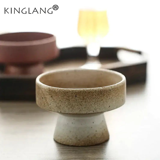 Earthenware retro floral ceramic footed cup with speckled beige and white glaze decorbites handmade design