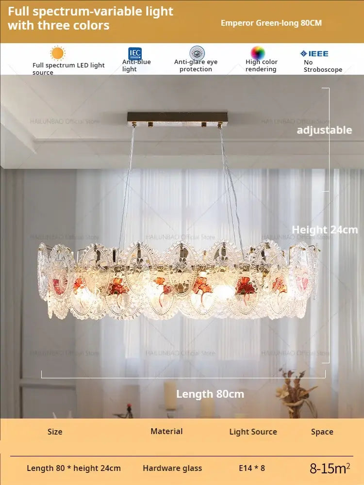 Retro French floral glass dining room chandelier with gold and green circular design featuring clear and amber glass panels
