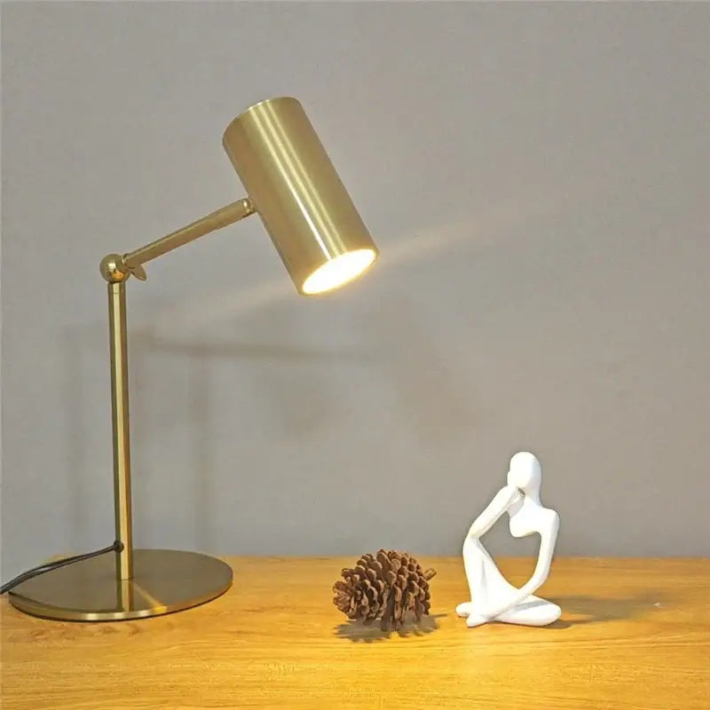 Gold-finished retro floor lamp with adjustable angle arm and cylindrical head ideal for bedroom reading light decorbites adjustable angle