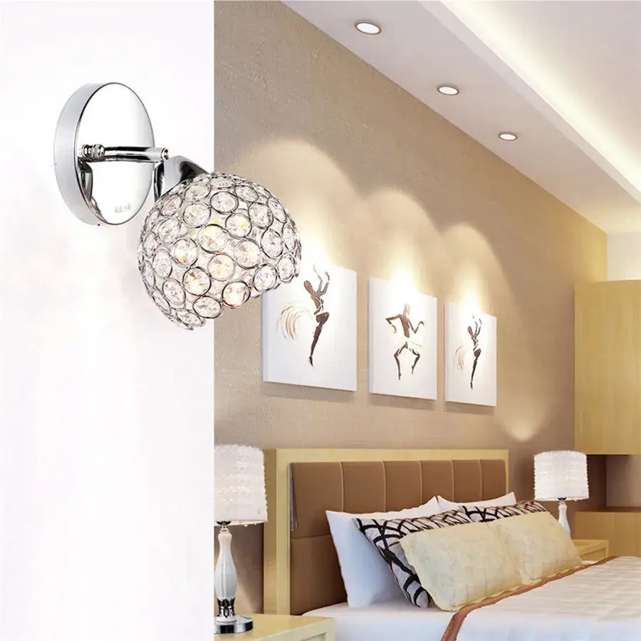 Chrome finished crystal wall sconce with a spherical globe design for retro gold and chrome living room decorbites crystal wall sconce