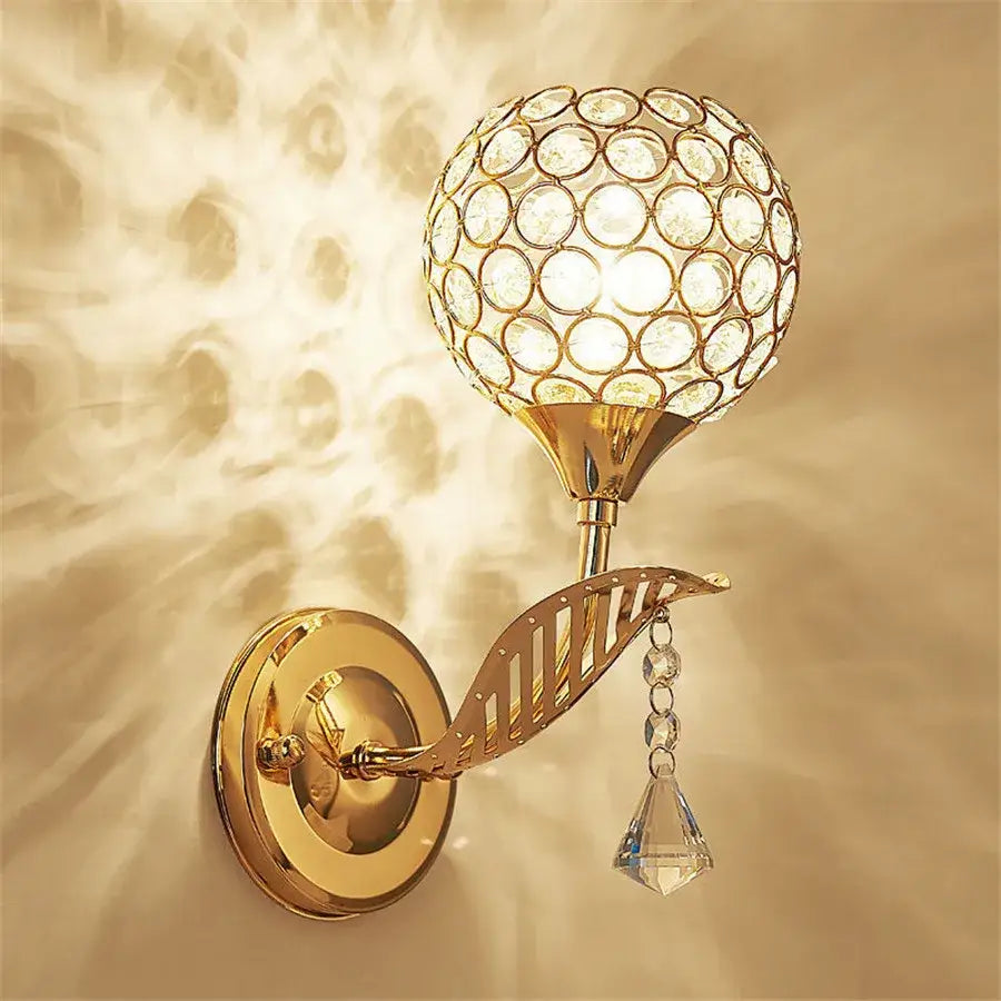 Retro gold crystal wall sconce with spherical globe and faceted pendant for elegant living room decorbites crystal wall
