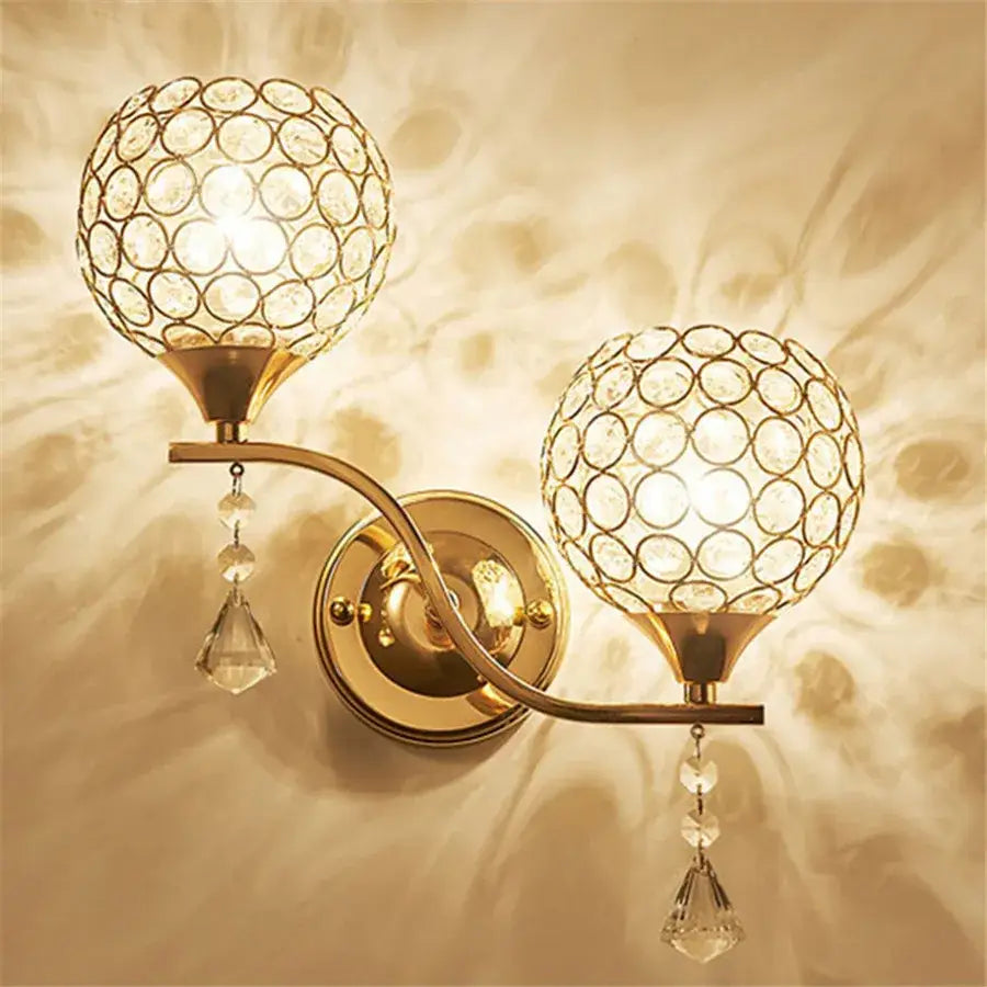 Retro gold and chrome crystal wall sconce with two spherical globe shades and faceted teardrop accents for living room decorbites crystal wall sconce