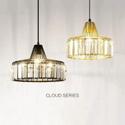Two elegant gold-toned decorbites crystal led pendant lights with clear crystal prisms for dining room lighting