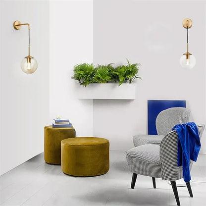 Gold-finished wall lamp with clear glass globe shade decorbites glass ball wall lamp retro bedroom smoked sconce