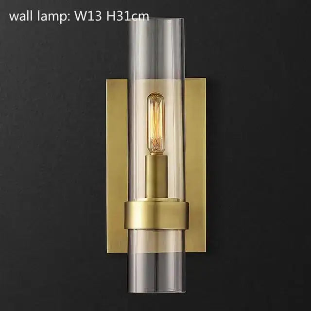 Gold-toned glass chandelier pendant lamp with clear glass cylinder and exposed filament bulb for dining room use