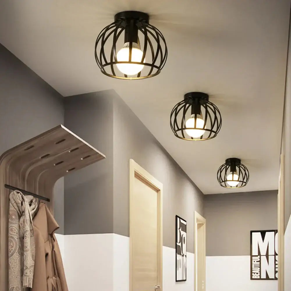 Black wrought iron cage retro ceiling lamp with warm glow lighting ideal for bedroom decorbites iron cage style