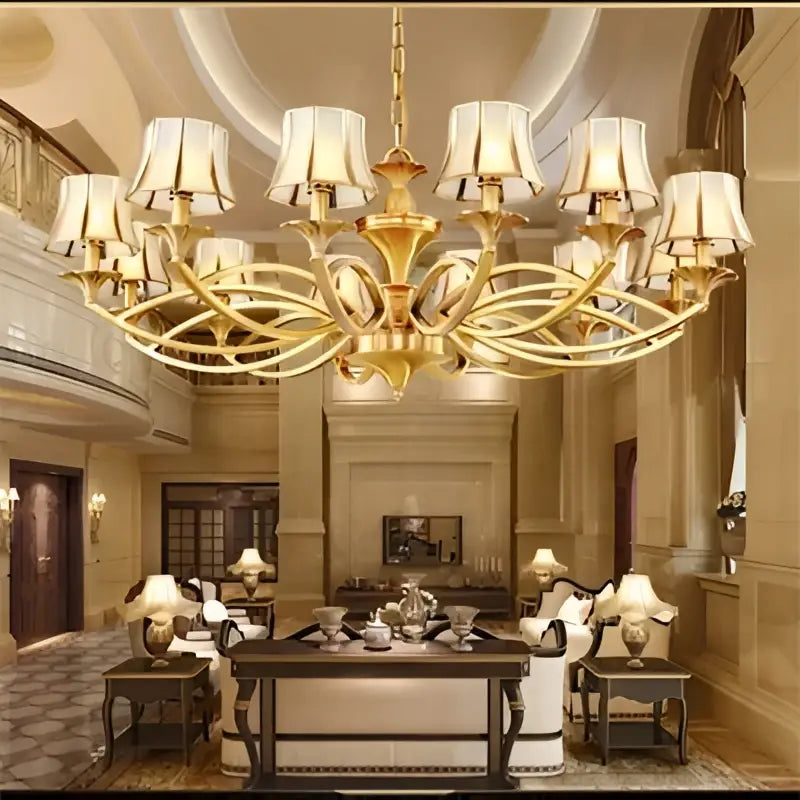 Golden ornate decorbites copper villa chandelier with multiple cream lampshades for villa staircase decor
