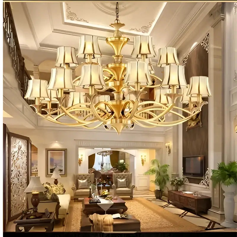 Gold-toned decorbites copper villa chandelier with multiple cream lampshades ideal for staircase lighting decorbites copper