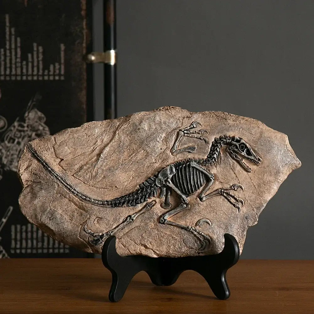 Detailed dark gray dinosaur fossil embedded in textured beige rock slab retro animal statue for living room decor