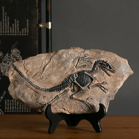 Detailed dark gray dinosaur fossil embedded in textured beige rock slab retro animal statue for living room decor