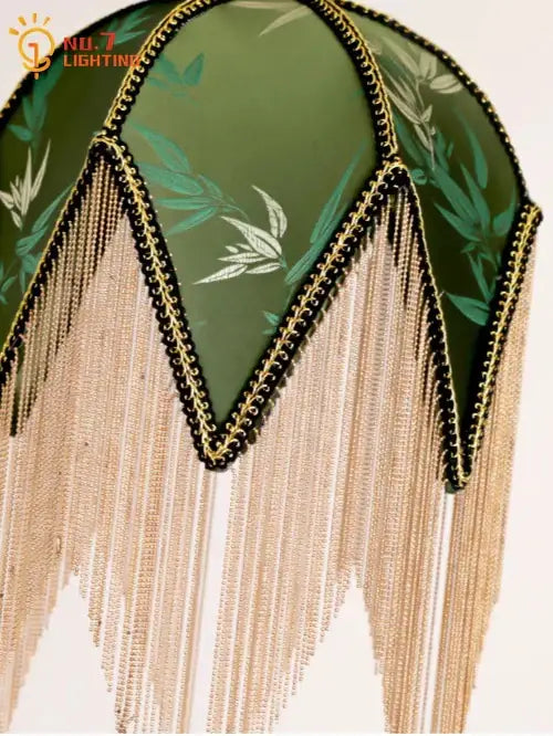 Elegant olive green pendant lights with delicate bamboo leaf pattern gold black beaded trim and decorbites copper tassel fringe