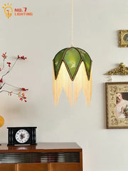 Retro green and gold copper tassel pendant light with leaf shape and cream fringe, perfect for dining room decorbites copper tassel