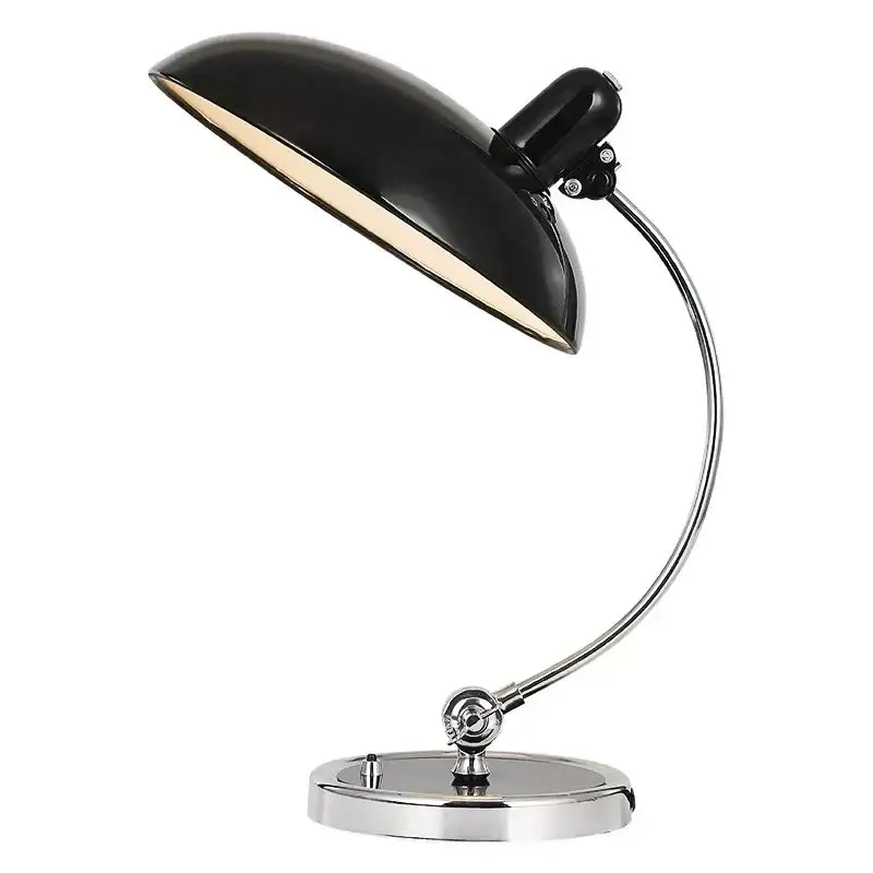 Black enamel table lamp with curved chrome arm and base suitable for office or bedroom engraving table use