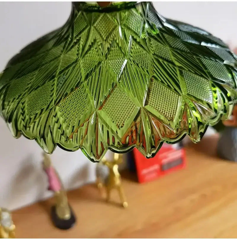 Retro green glass pendant light with wood accent featuring a scalloped diamond-patterned lampshade for dining room use
