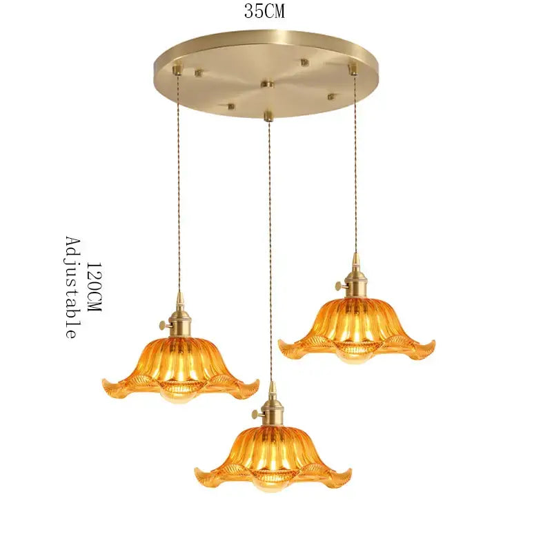 Golden amber glass pendant light with brass finish and petal design featuring wood accent for dining room with e27 led bulb