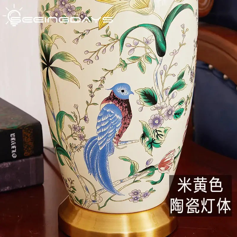 Cream-colored ceramic table lamp base with intricate hand-painted country flower bird design for decorbites bedroom decor