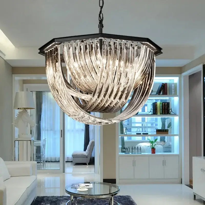 A modern pendant light with a black hexagonal decorbites black metal frame and twisted glass strands, ideal for living rooms