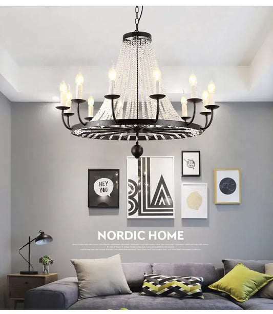 Black wrought iron decorbites crystal chandelier with cascading clear droplets and candle-style bulbs for dining room